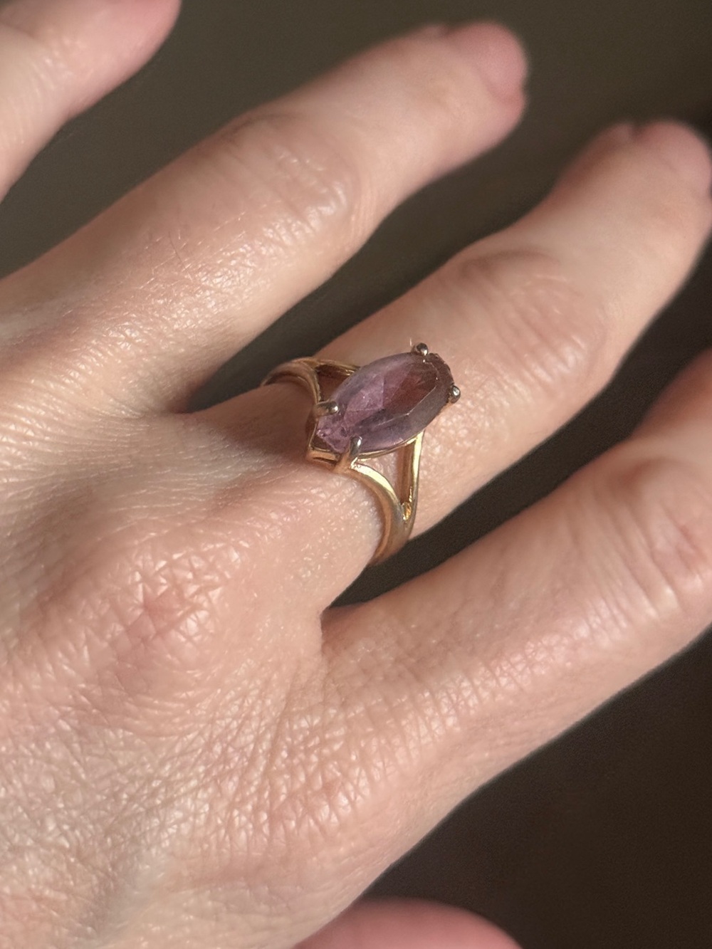 vintage 14kt plated yellow gold ring featuring a marquise-cut amethyst gemstone